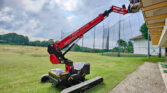 almac crane working underneath guttering