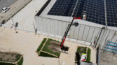 almac jibbi working on solar panels