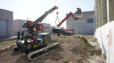 two almacs on building site at work